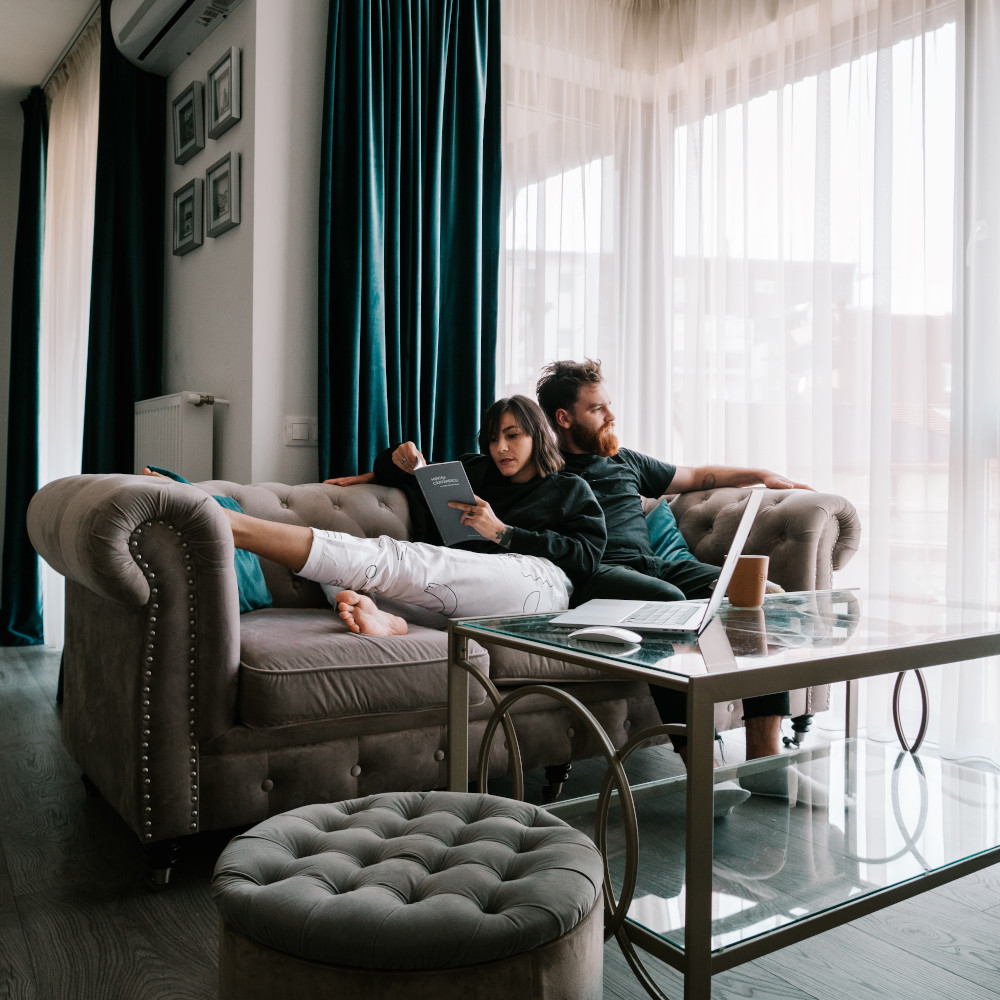couple relaxing in living room